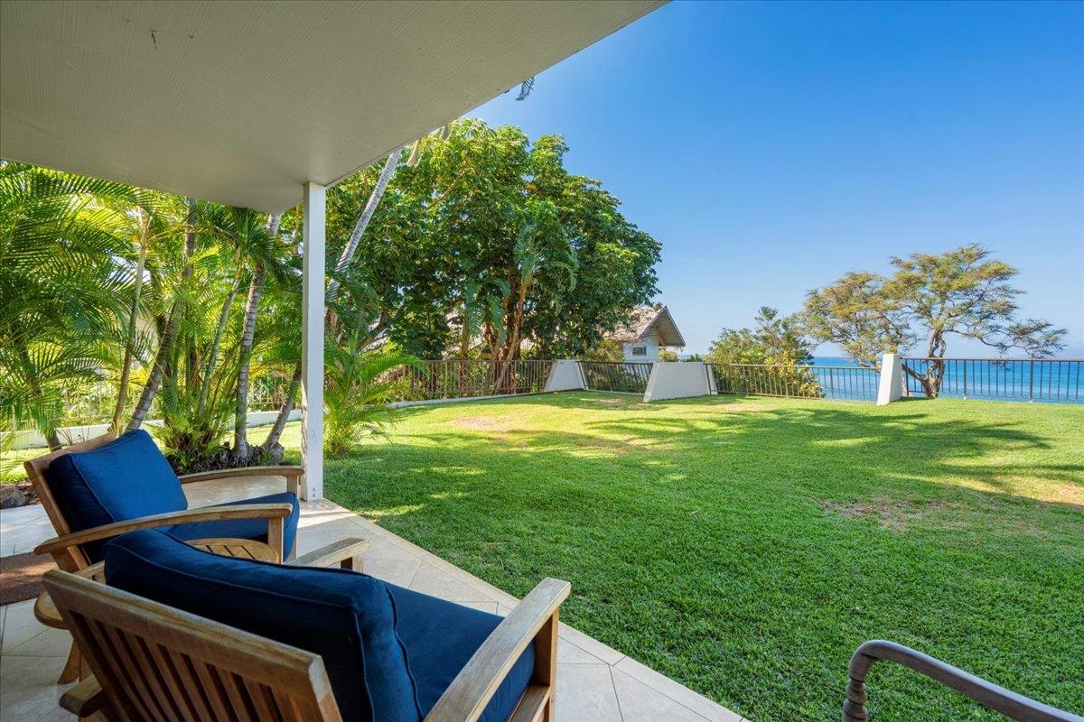 5271 Lower Honoapiilani Road, Unit B44 Lahaina, HI 96761 - Photo 11 of 25 a view of a backyard with sitting area