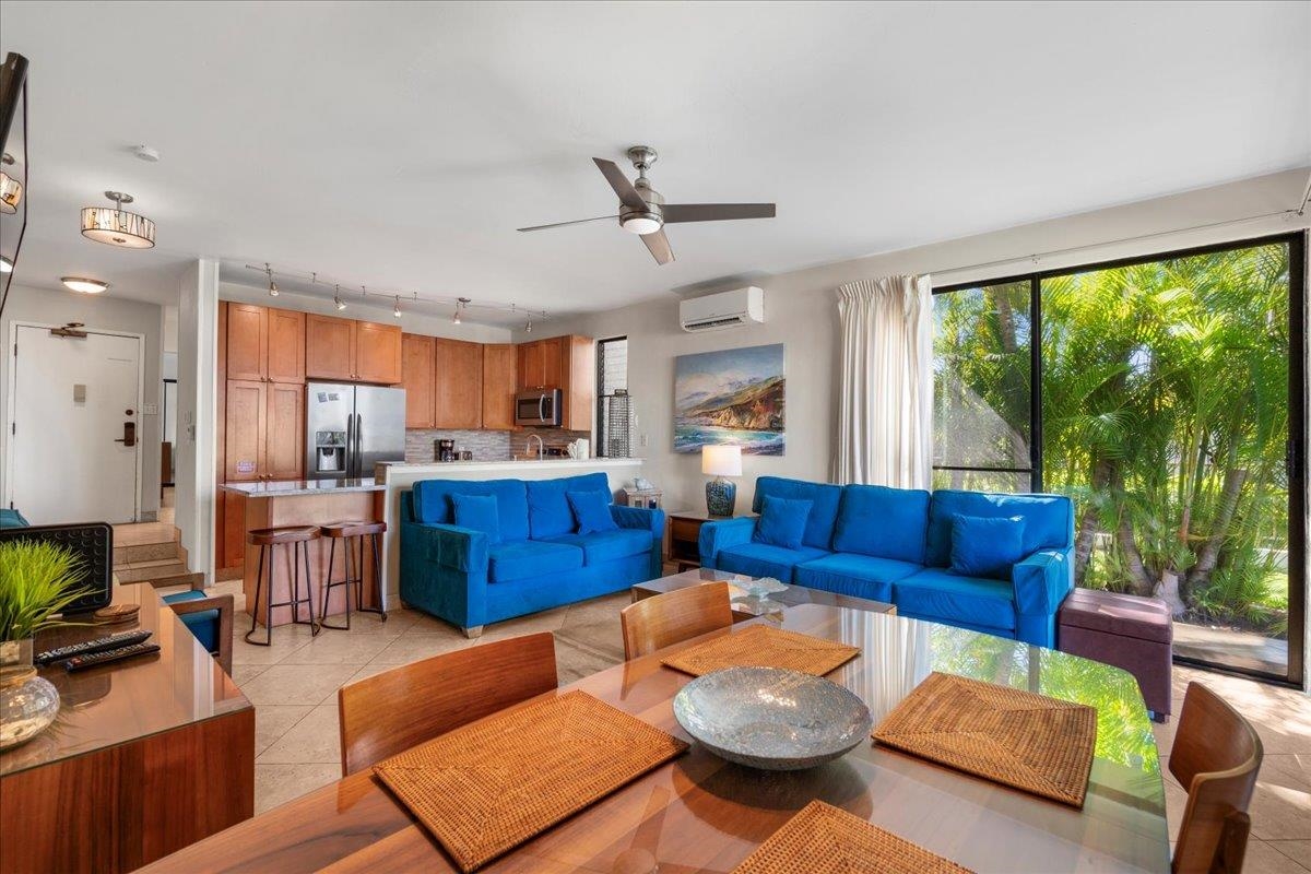 5271 Lower Honoapiilani Road, Unit B44 Lahaina, HI 96761 - Photo 8 of 25 a living room with furniture and a open kitchen view