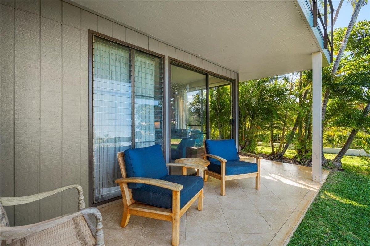 5271 Lower Honoapiilani Road, Unit B44 Lahaina, HI 96761 - Photo 10 of 25 a building outdoor space with patio furniture and potted plants
