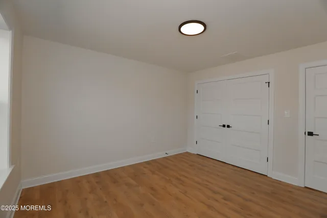 a view of a bathroom with a sink and mirror