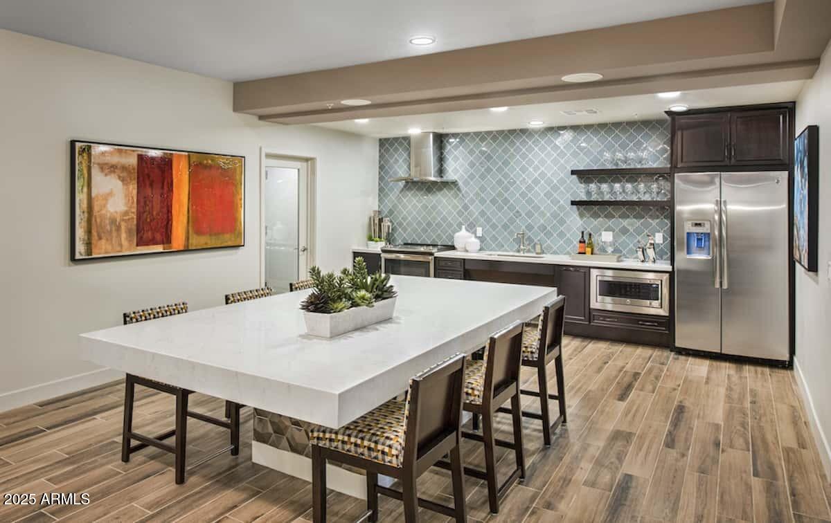 2511 West Queen Creek Road, Unit 230 Chandler, AZ 85248 - Photo 19 of 37 Clubhouse kitchen