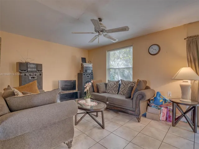 a kitchen with a stove and a refrigerator