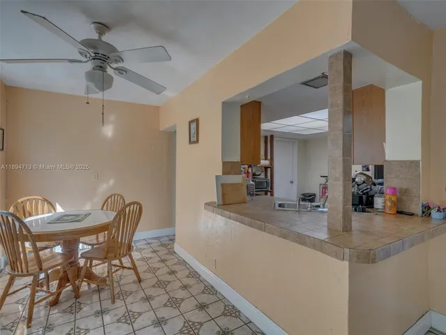 a view of a tree in a yard