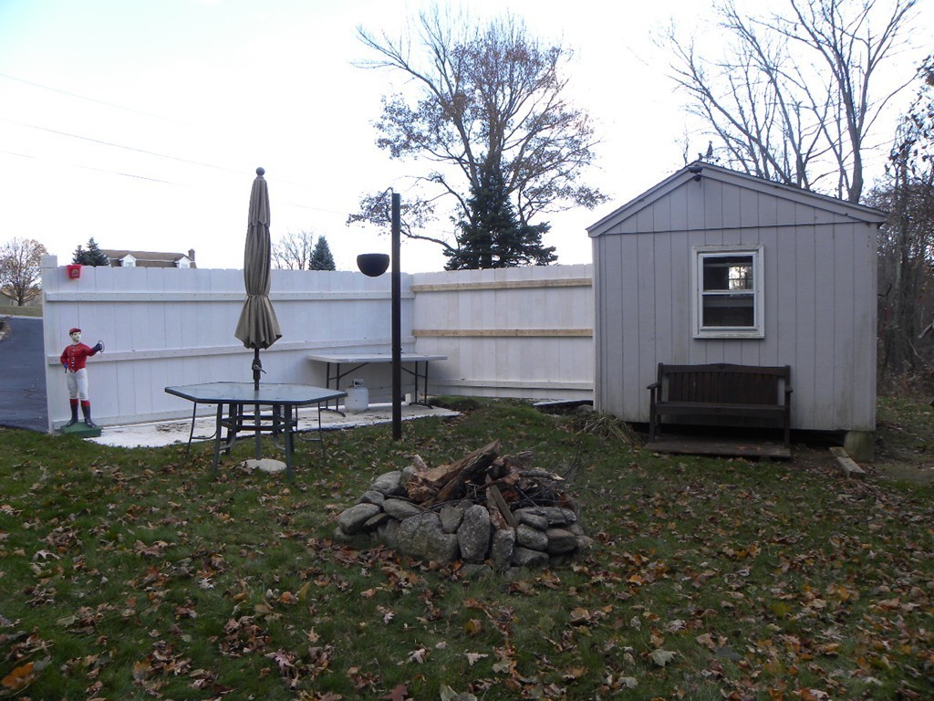 51 J Davis Road Charlton, MA 01507 - Photo 23 of 30 a view of a house with backyard and trees