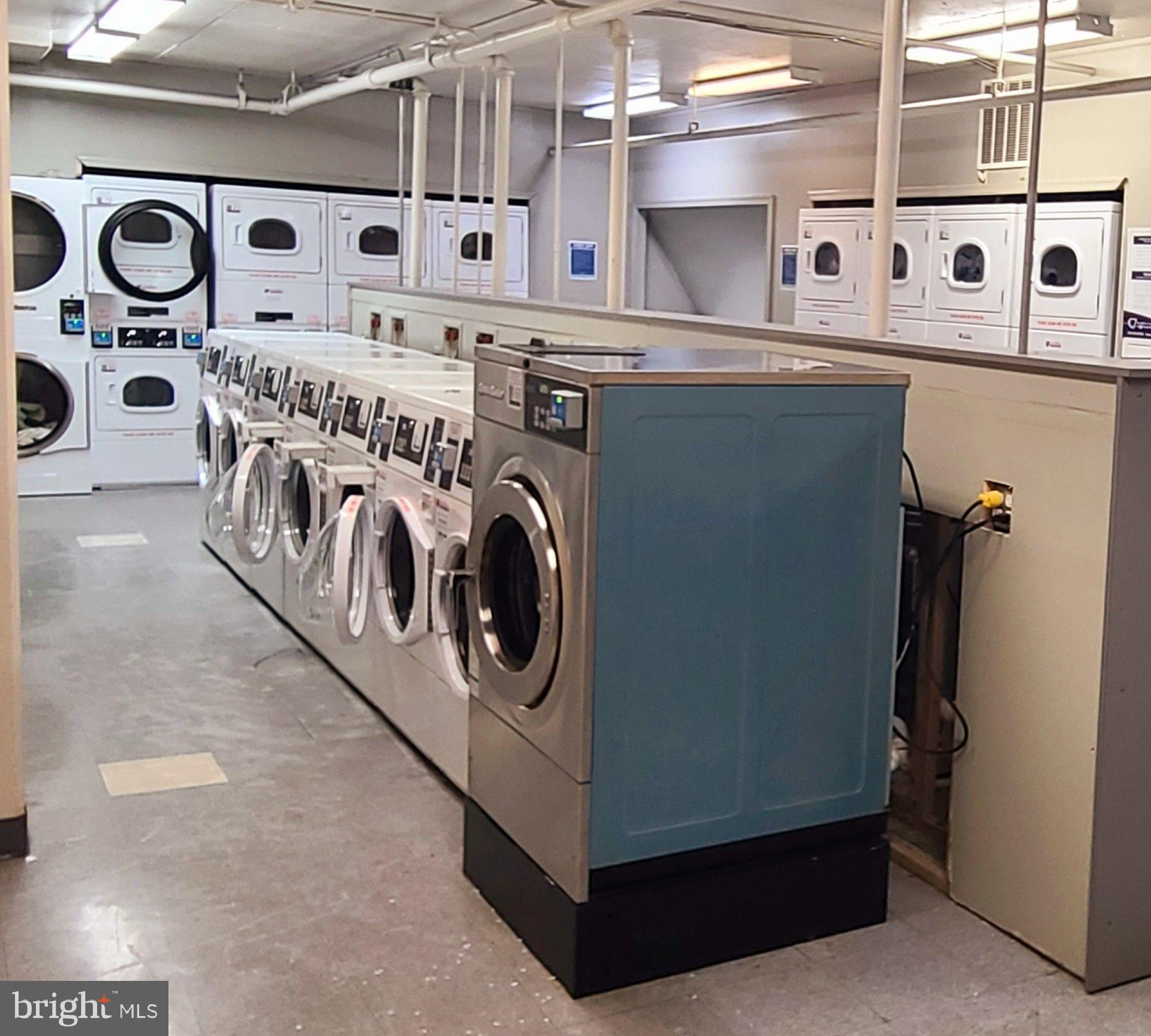 1021 Arlington Boulevard, Unit 330 Arlington, VA 22209 - Photo 27 of 48 a utility room with dryer and washer