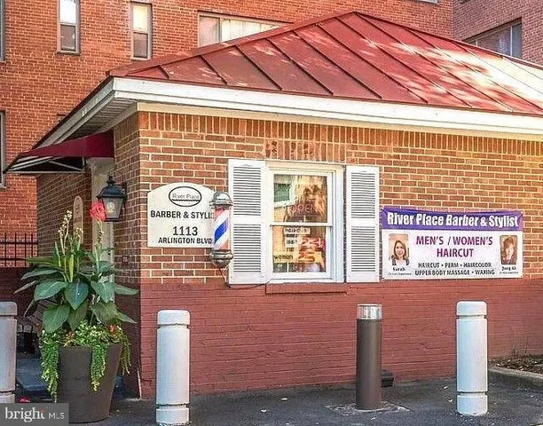 a tall building sitting next to a road