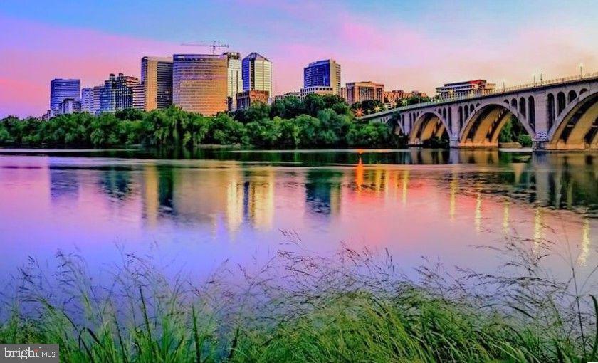 1021 Arlington Boulevard, Unit 330 Arlington, VA 22209 - Photo 46 of 48 outdoor view of house with outdoor space and lake