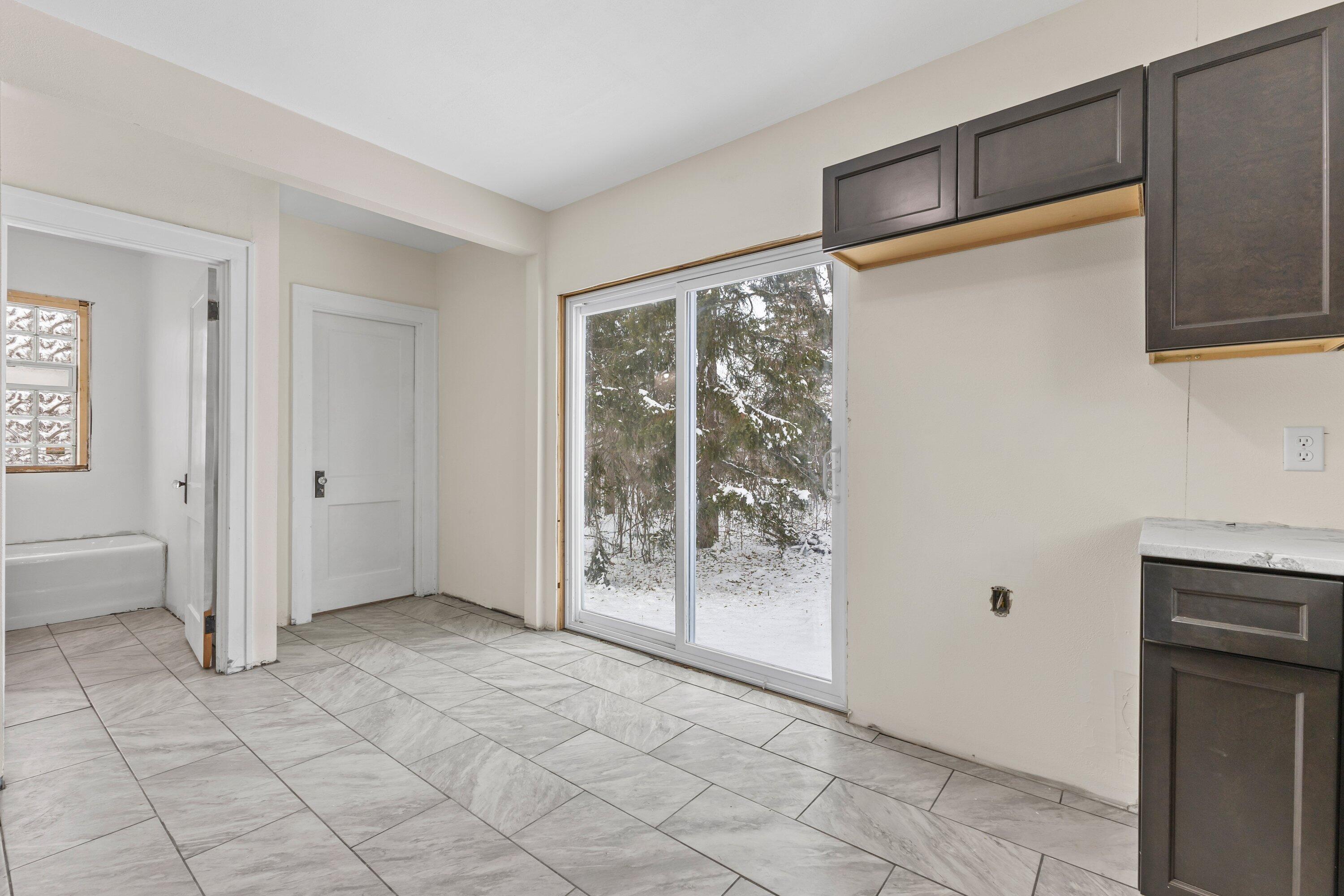 202 West Brown Deer Road Bayside, WI 53217 - Photo 13 of 32 Laundry on main off kitchen