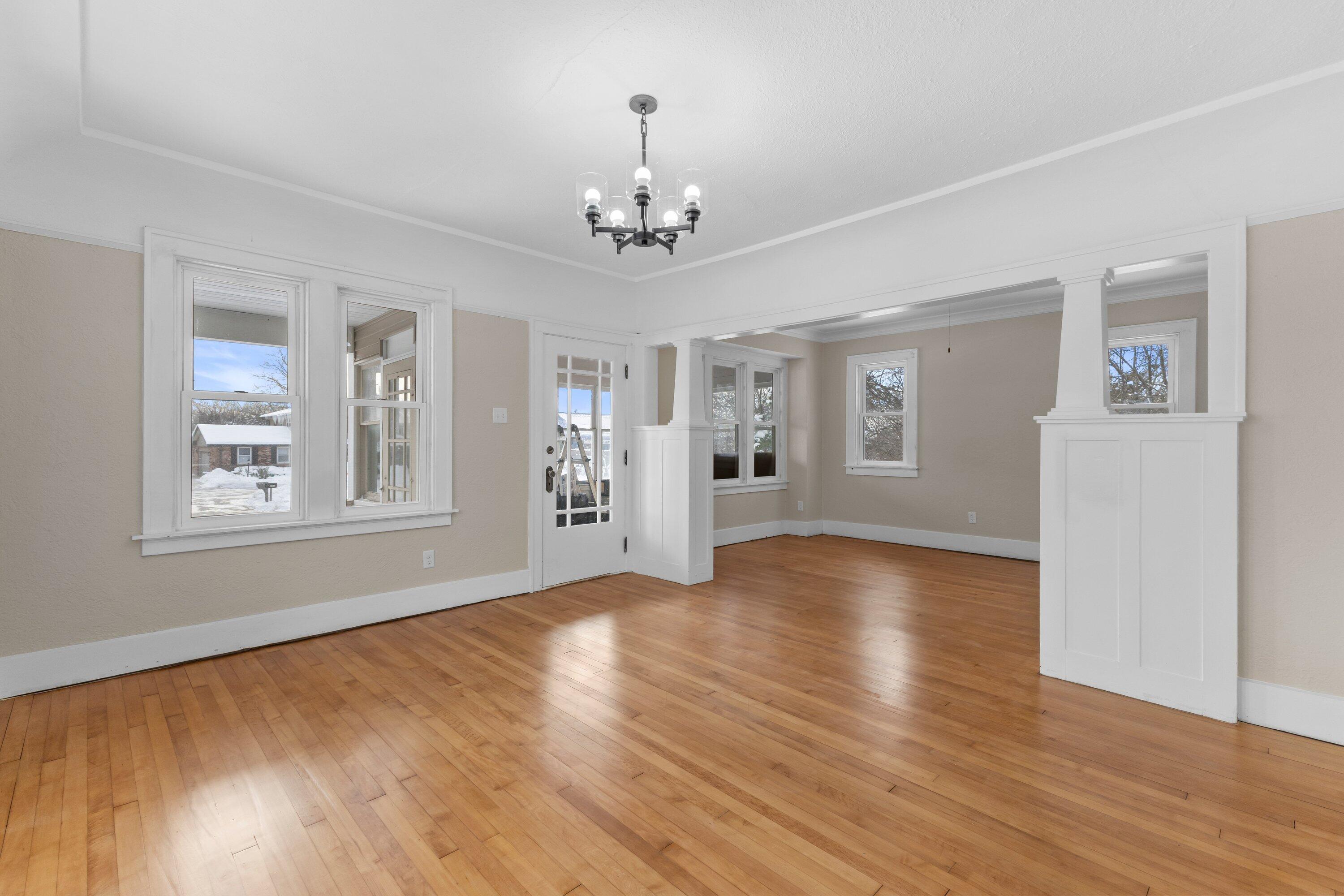 202 West Brown Deer Road Bayside, WI 53217 - Photo 2 of 32 refinished HWF shine in LR/DR