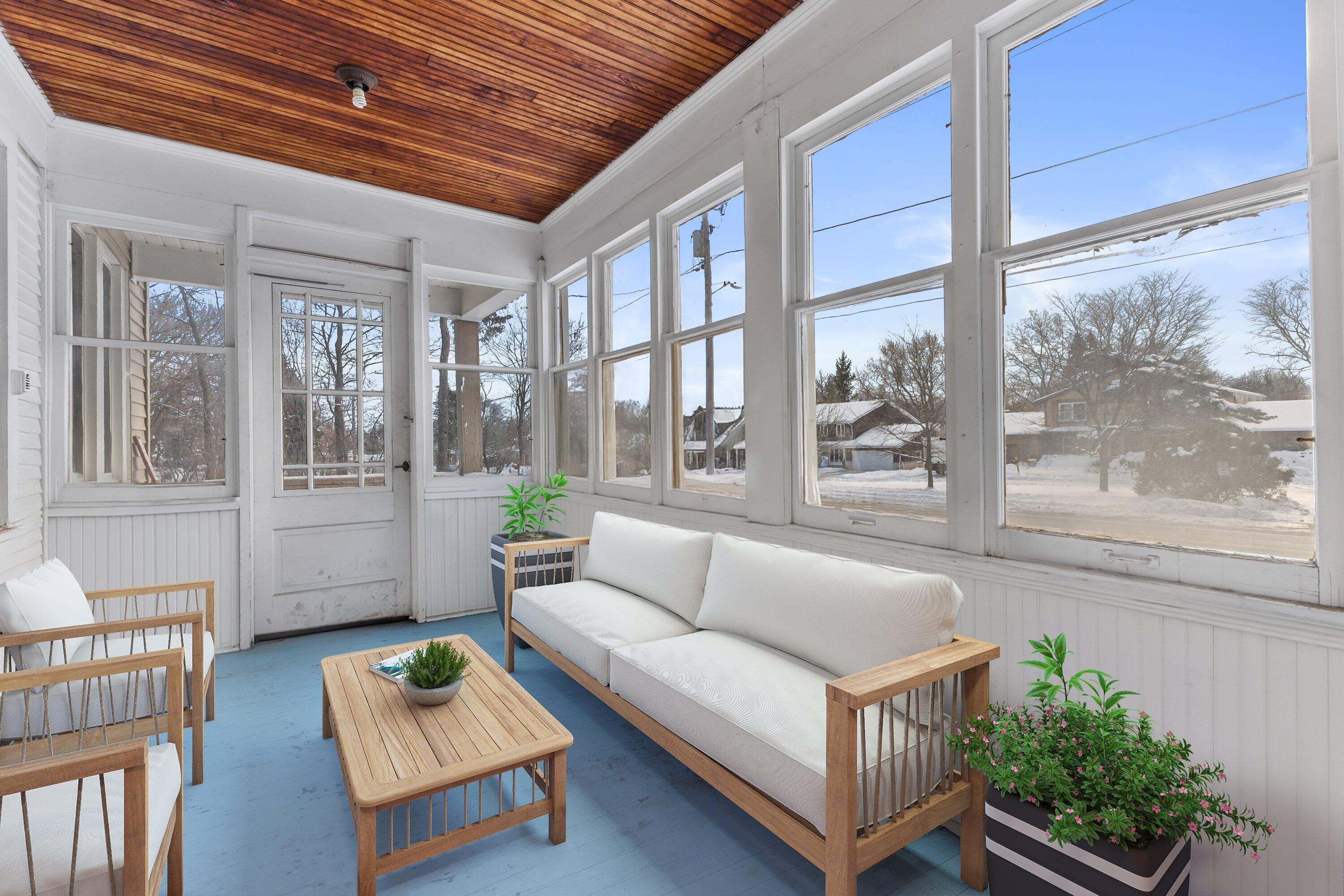 202 West Brown Deer Road Bayside, WI 53217 - Photo 5 of 32 sunroom porch off LR/DR (V staged)