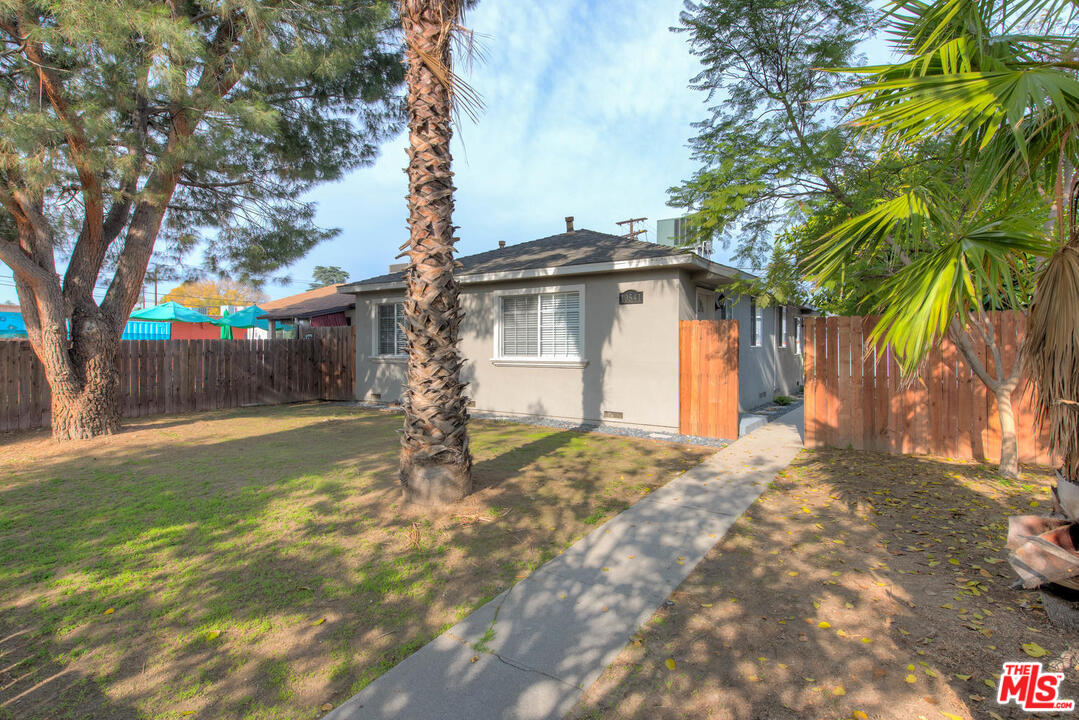 10541 Chandler Boulevard North Hollywood, CA 91601 - Photo 2 of 17 a view of a house with a yard