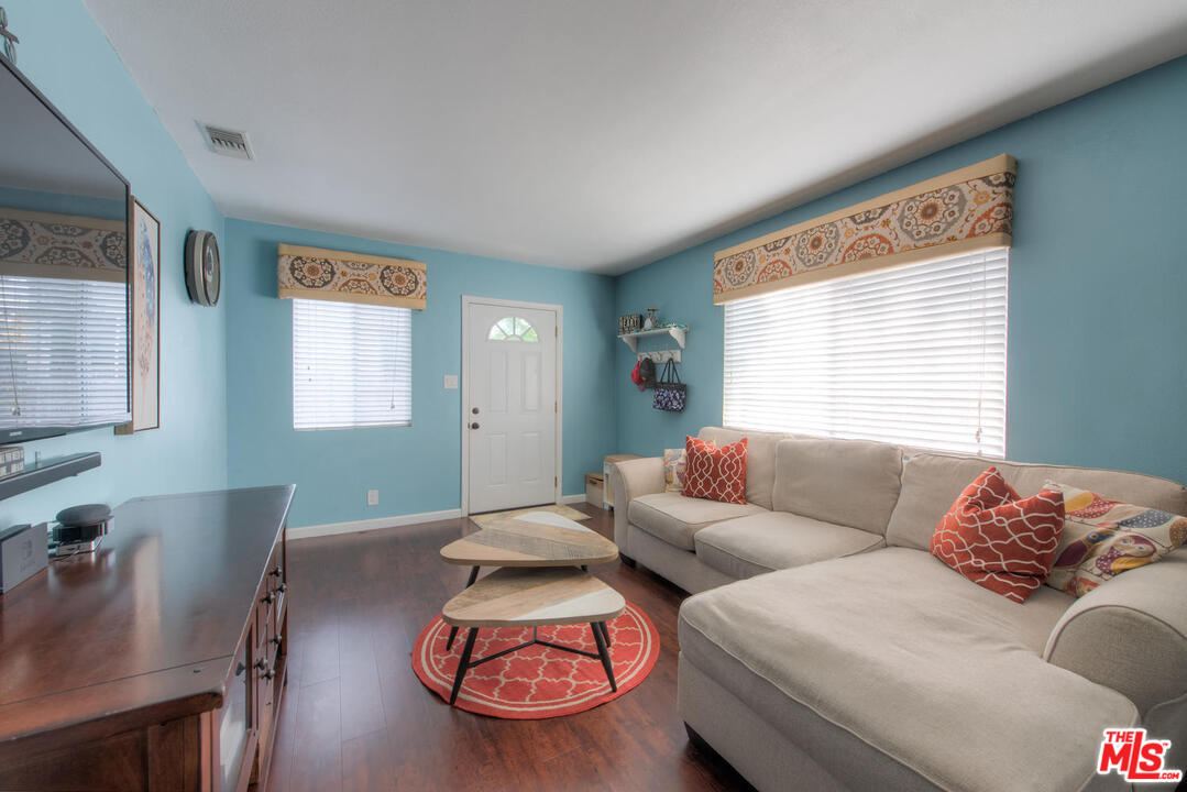 10541 Chandler Boulevard North Hollywood, CA 91601 - Photo 4 of 17 a living room with furniture and a large window