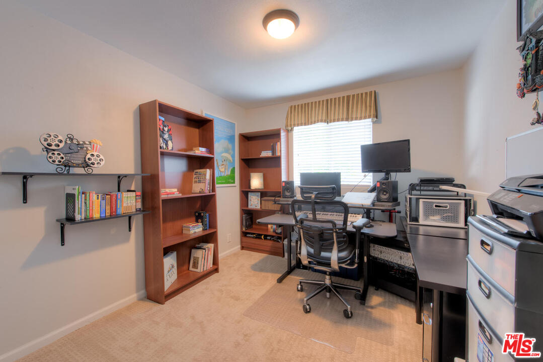 10541 Chandler Boulevard North Hollywood, CA 91601 - Photo 8 of 17 a view of a workspace with furniture and a window