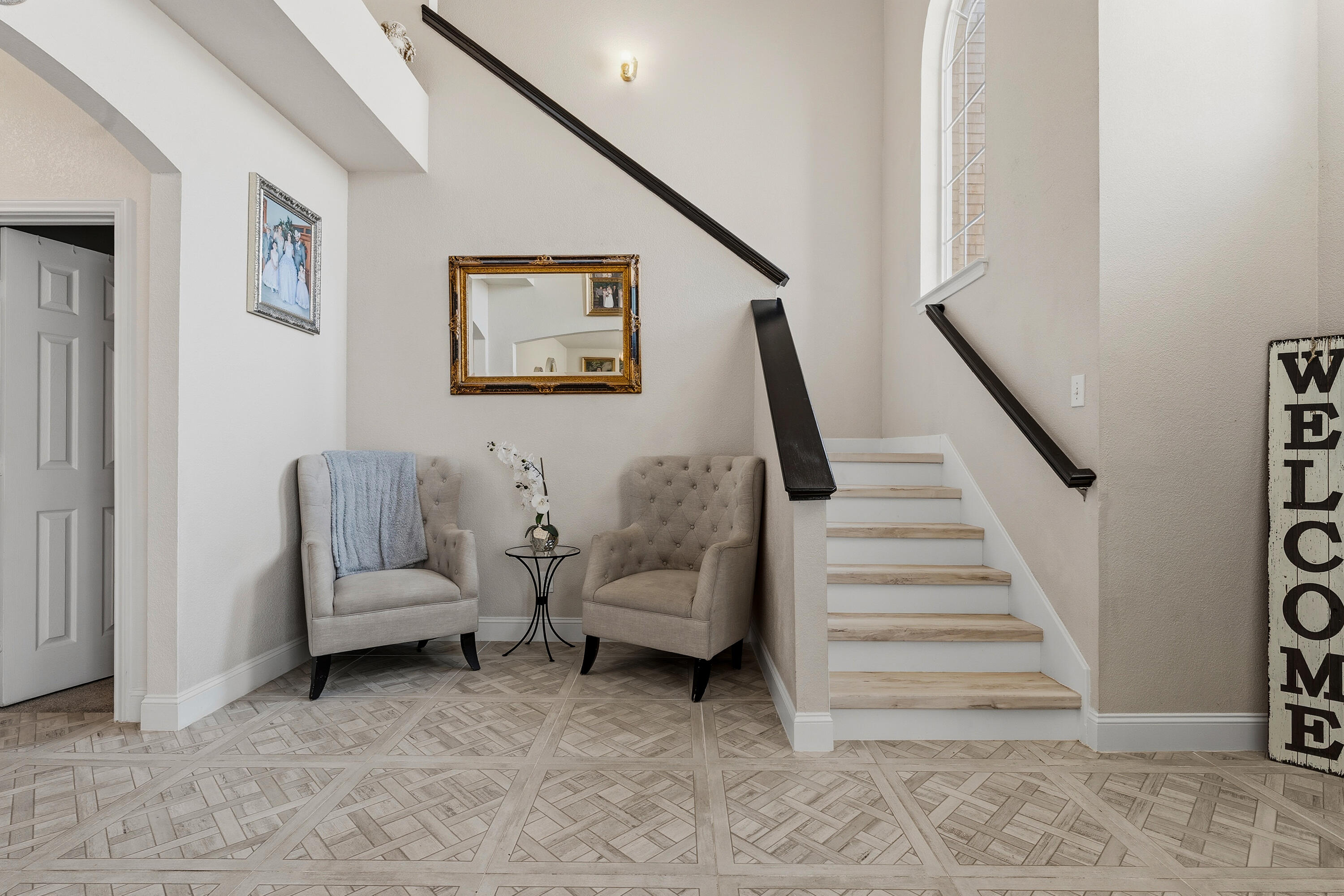 5833 102nd Street Lubbock, TX 79424 - Photo 12 of 36 a living room with furniture and stairs