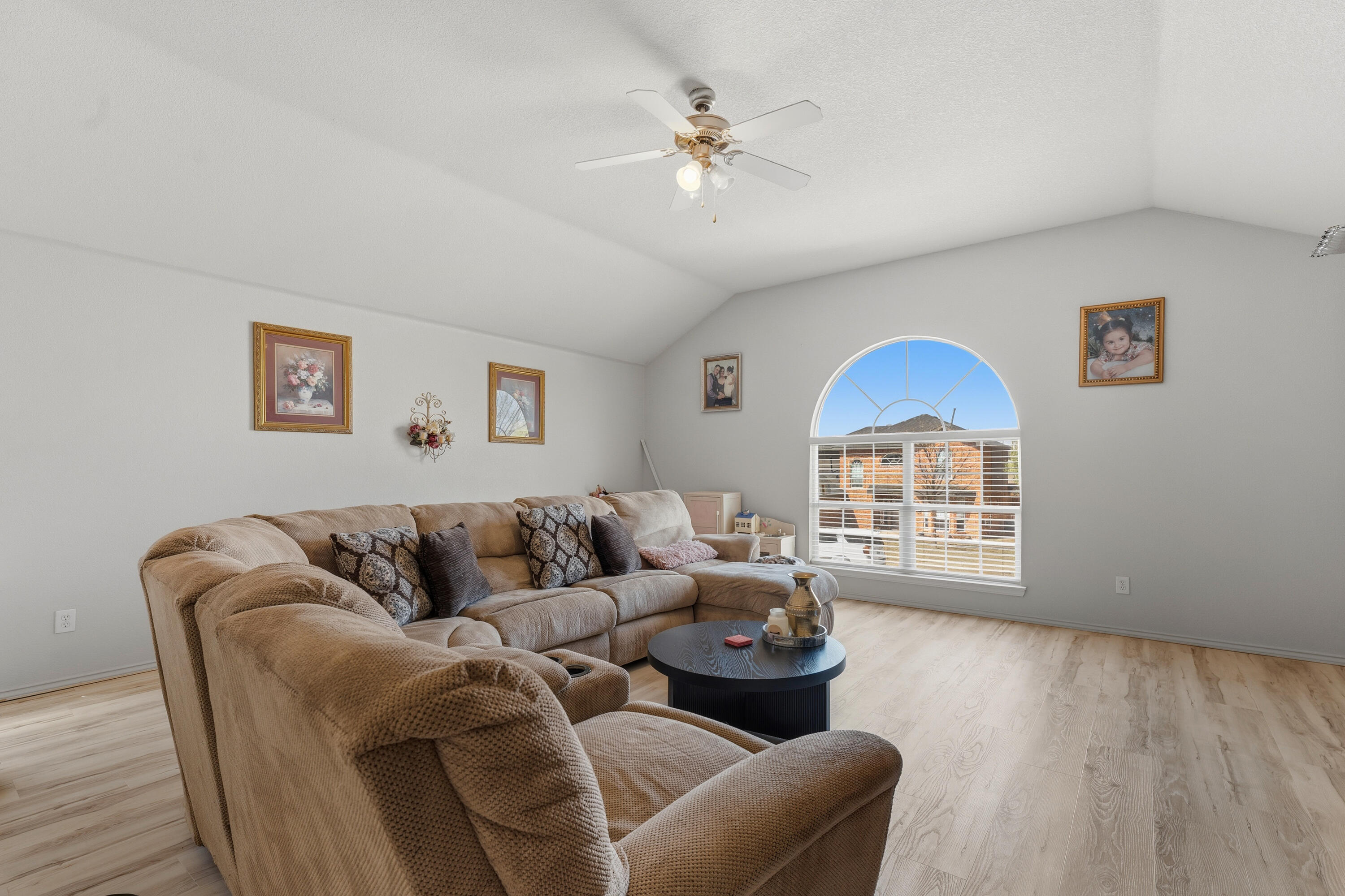 5833 102nd Street Lubbock, TX 79424 - Photo 14 of 36 a living room with furniture and a window