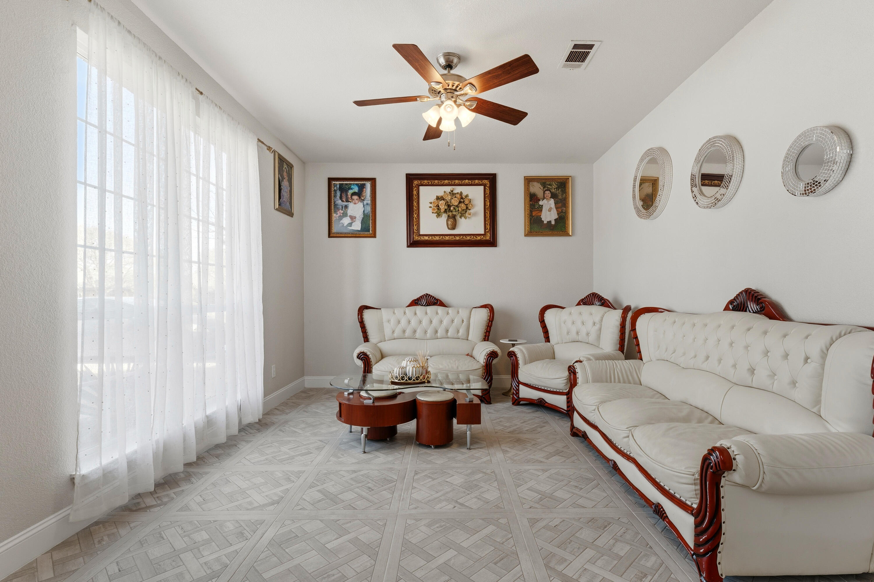 5833 102nd Street Lubbock, TX 79424 - Photo 20 of 36 a living room with furniture and a large window