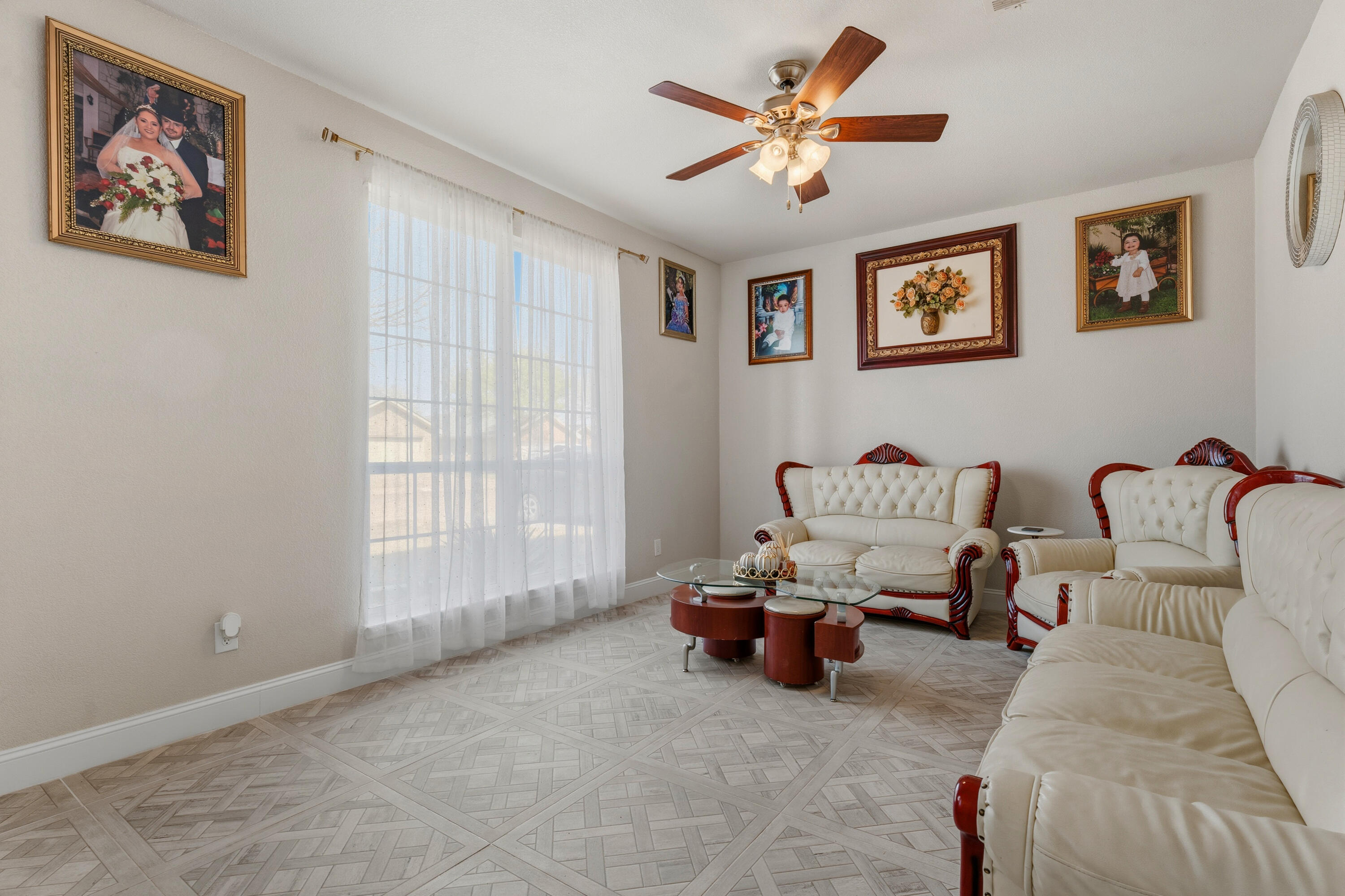 5833 102nd Street Lubbock, TX 79424 - Photo 21 of 36 a living room with furniture a couch and a window