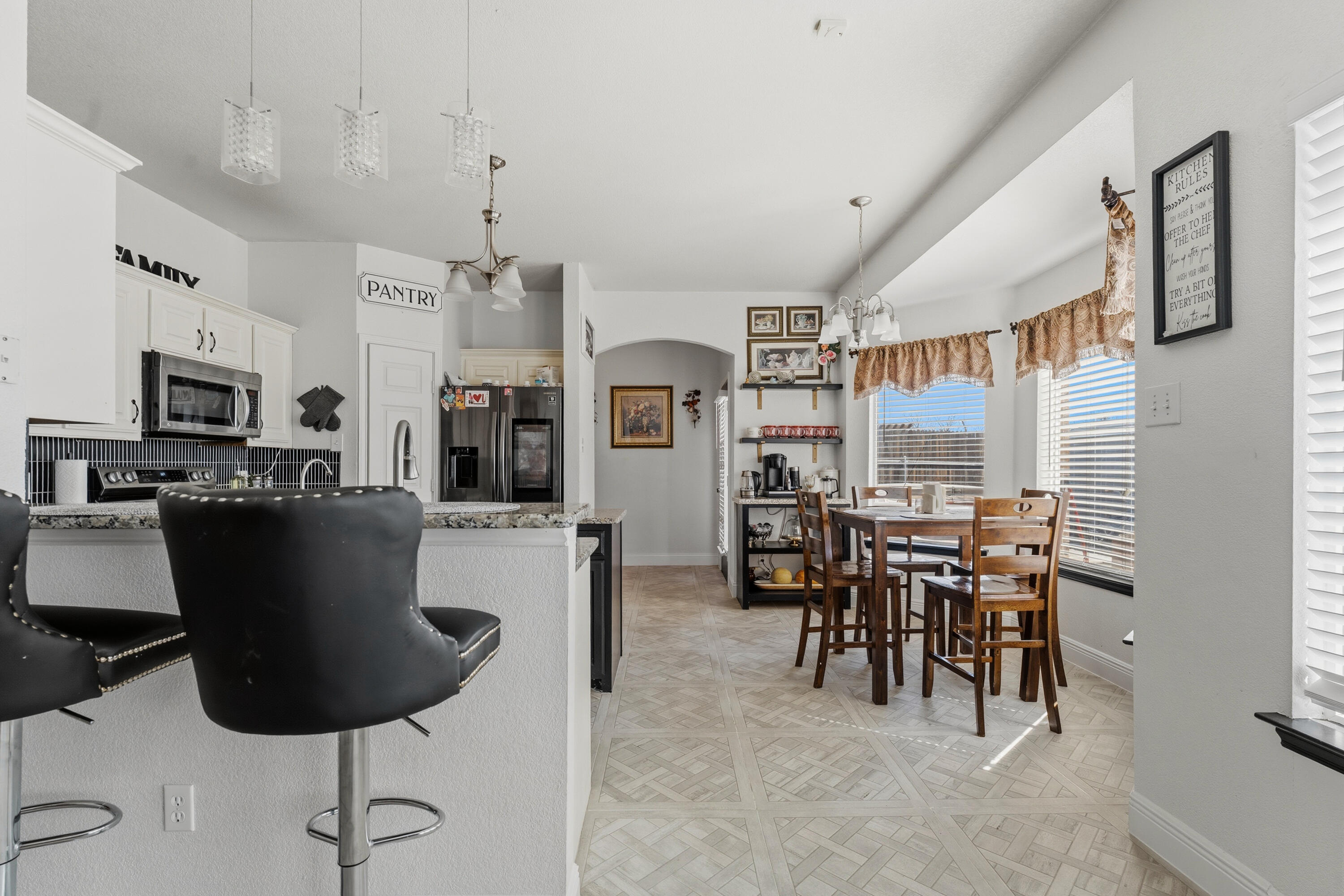 5833 102nd Street Lubbock, TX 79424 - Photo 7 of 36 a view of a dining room with furniture