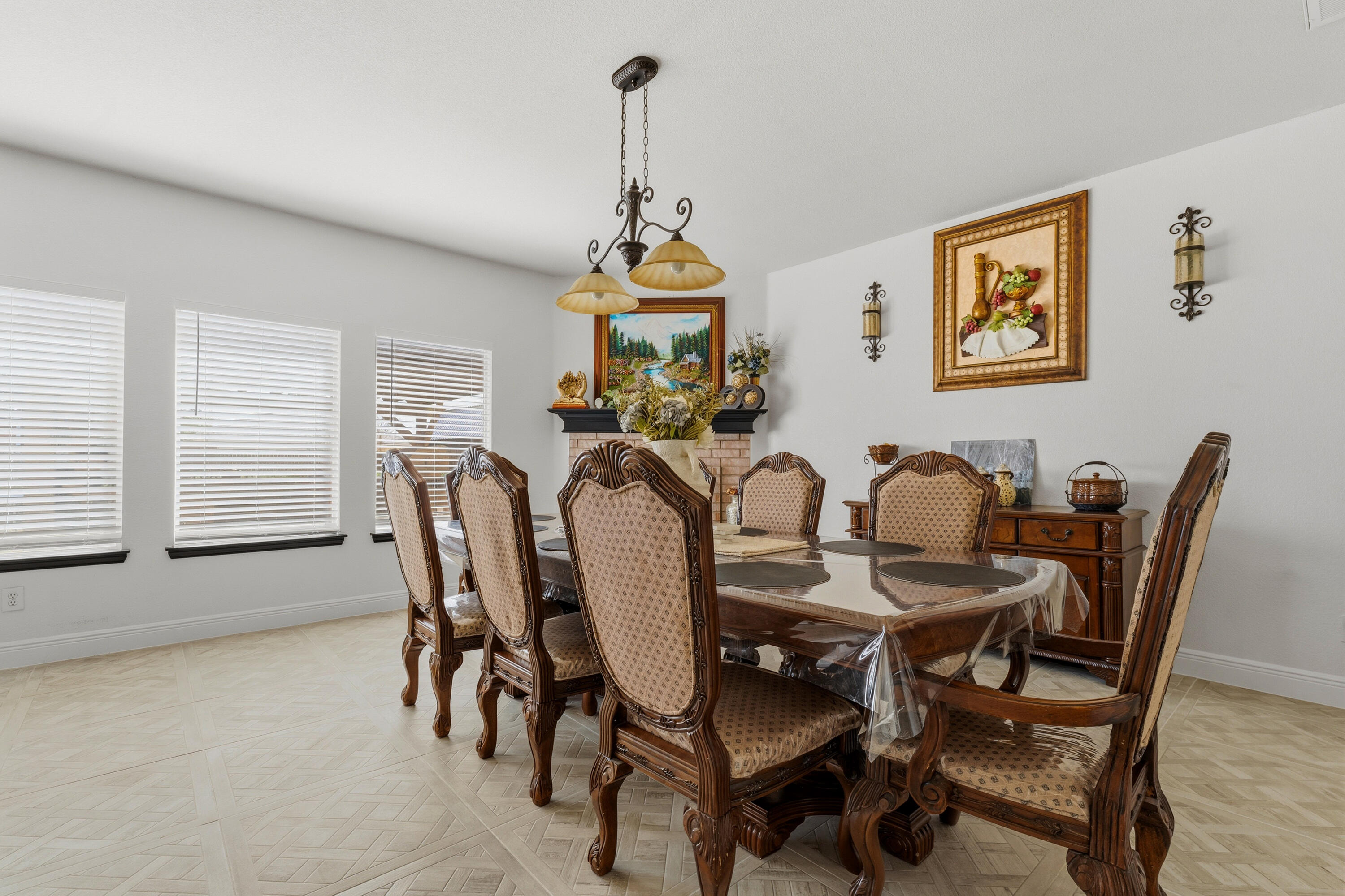 5833 102nd Street Lubbock, TX 79424 - Photo 9 of 36 a view of a dining room with furniture window and wooden floor