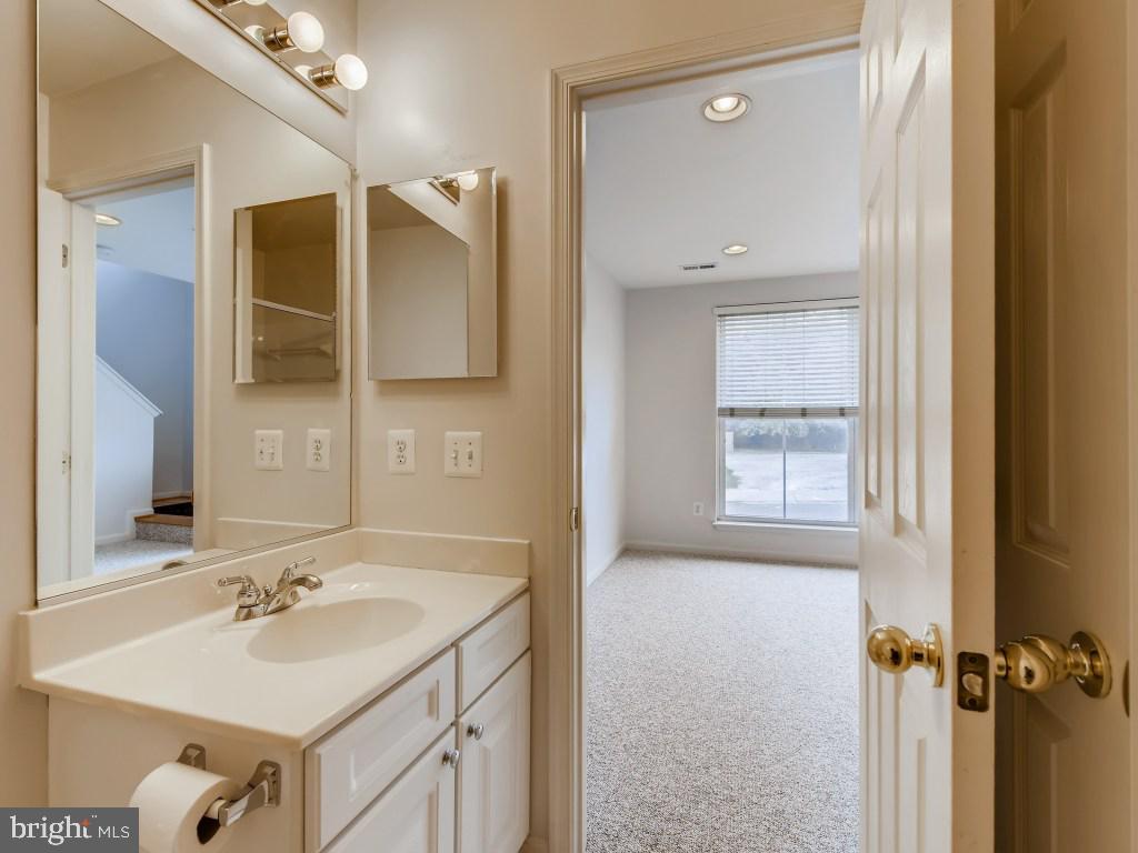 2066 Clipper Park Road Baltimore, MD 21211 - Photo 22 of 35 Downstairs full bath ensuite with bonus room