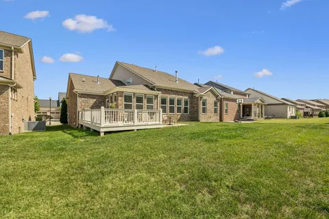 a view of a house with a big yard