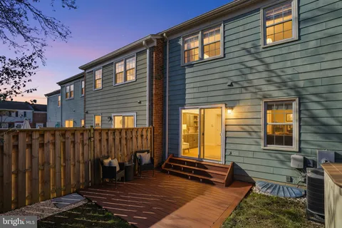 a front view of a house with a large window