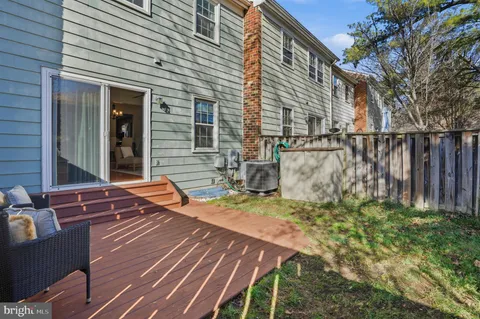 a backyard of a house with seating space