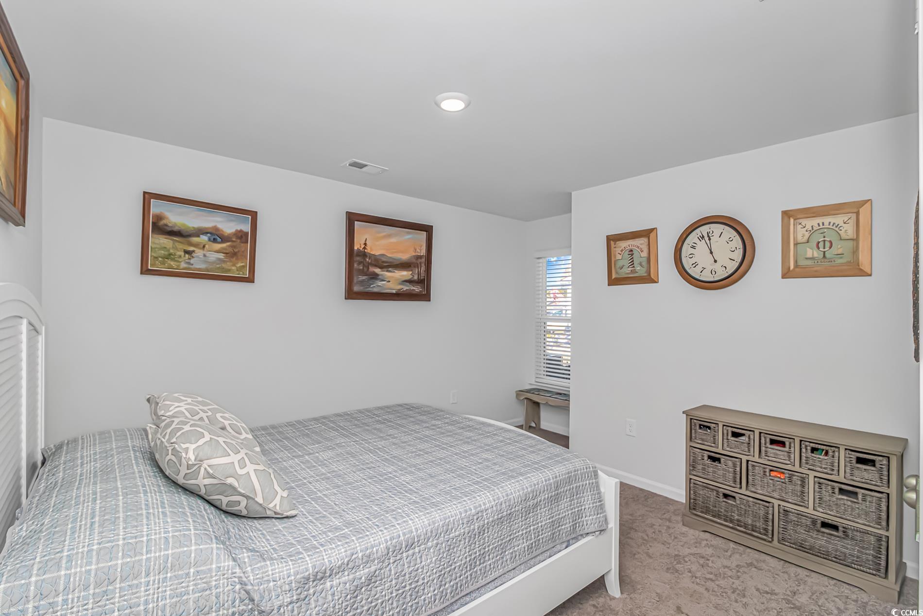 559 Courtridge Loop Conway, SC 29526 - Photo 16 of 37 Bedroom featuring light colored carpet