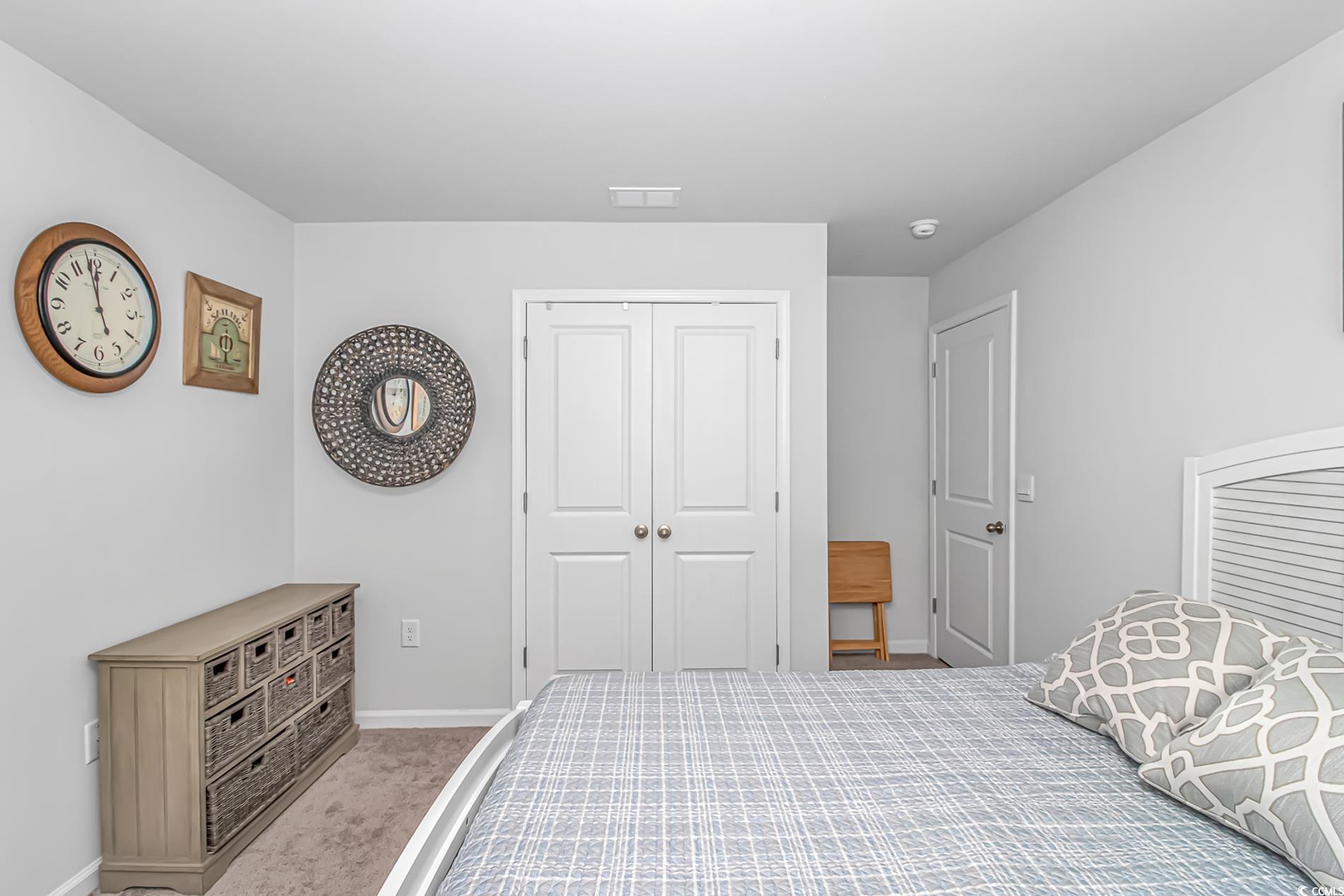 559 Courtridge Loop Conway, SC 29526 - Photo 17 of 37 Bedroom with light carpet and a closet