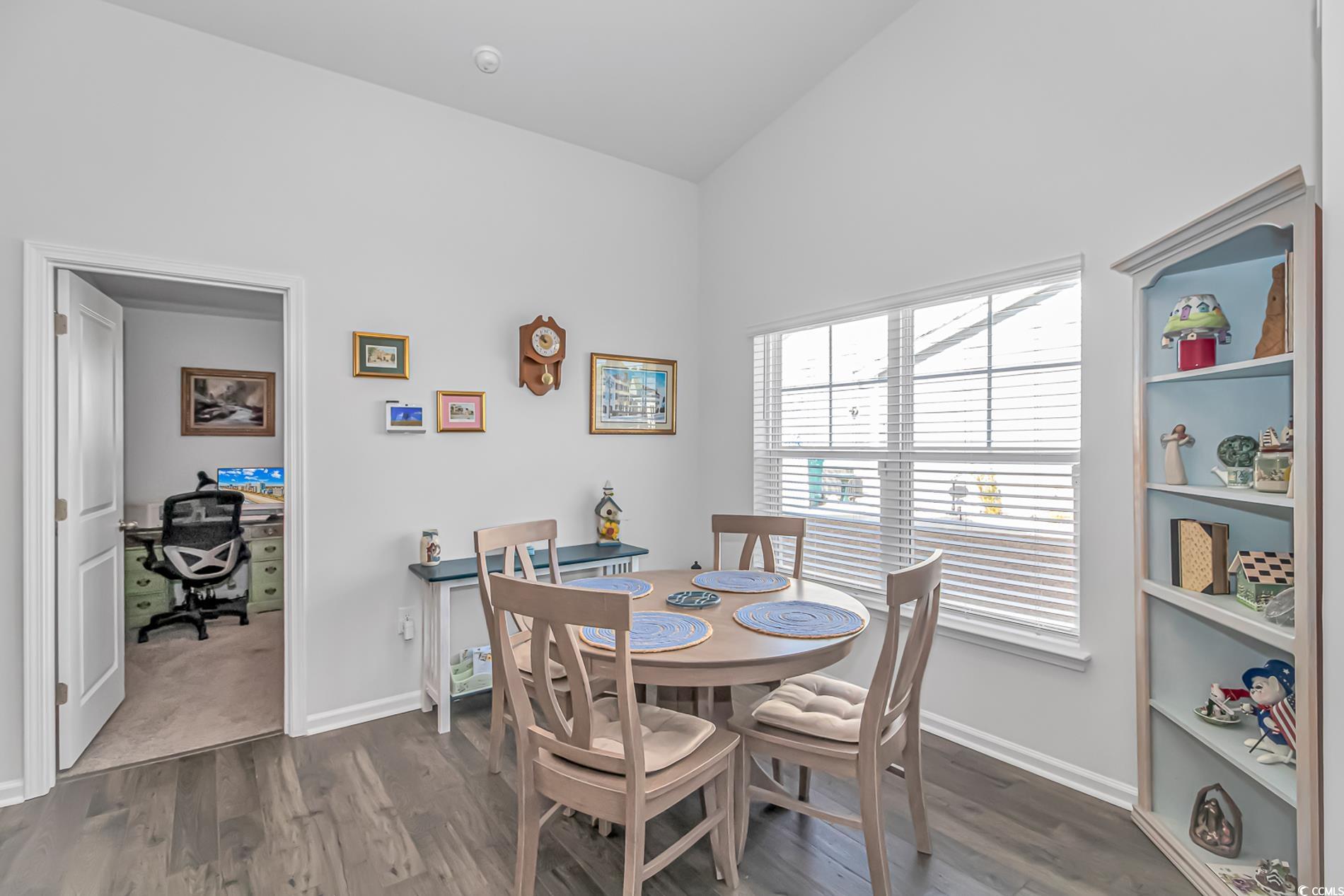 559 Courtridge Loop Conway, SC 29526 - Photo 6 of 37 Dining room featuring dark wood-type flooring and lofted ceiling