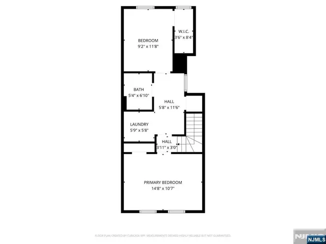 a picture of a bench in front of building