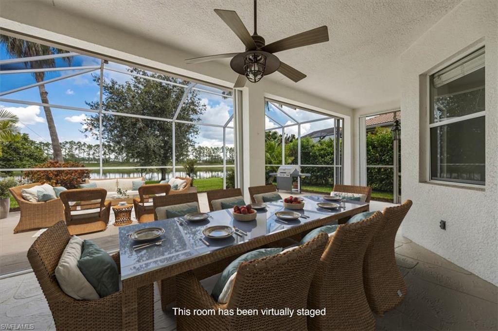 1087 Port Orange Way Naples, FL 34120 - Photo 32 of 50 a view of a dining room with furniture window and outside view
