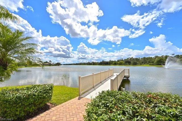a view of a lake with a garden