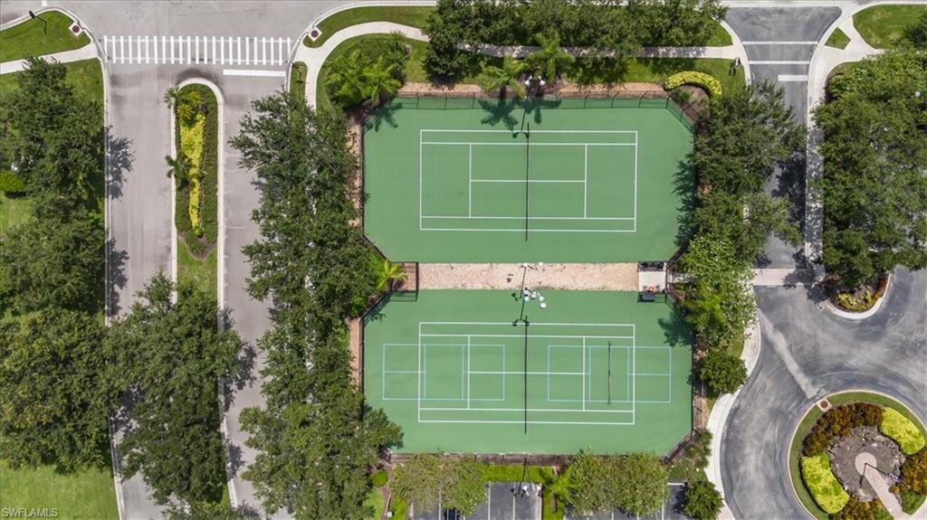 1087 Port Orange Way Naples, FL 34120 - Photo 40 of 50 an outdoor view of a garden