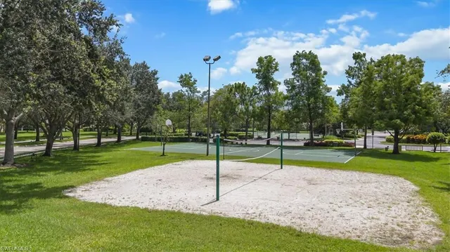 a view of a park with swings and slides