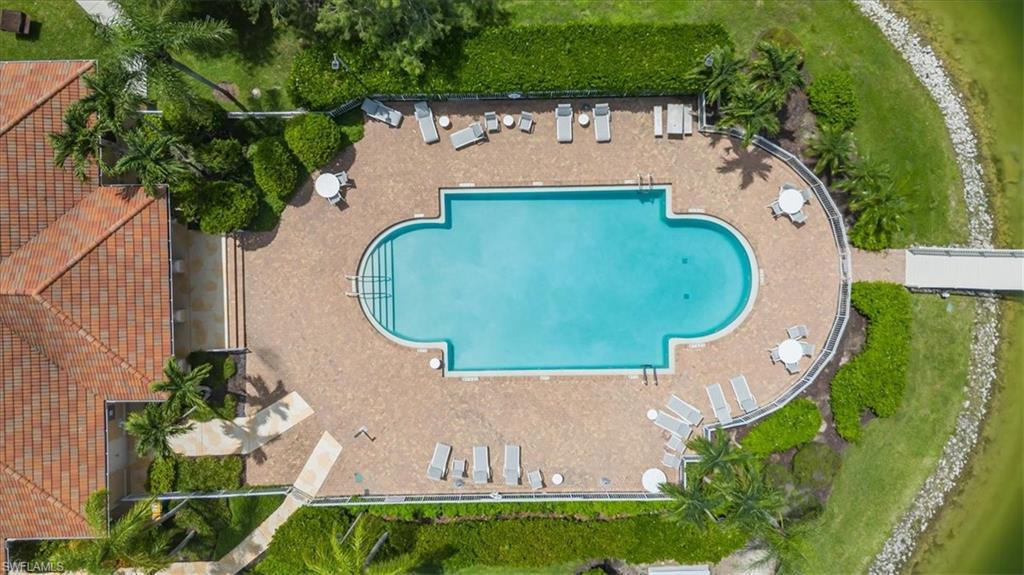 1087 Port Orange Way Naples, FL 34120 - Photo 44 of 50 an aerial view of a house with a swimming pool