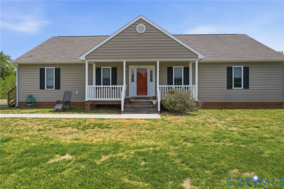front view of a house with a yard