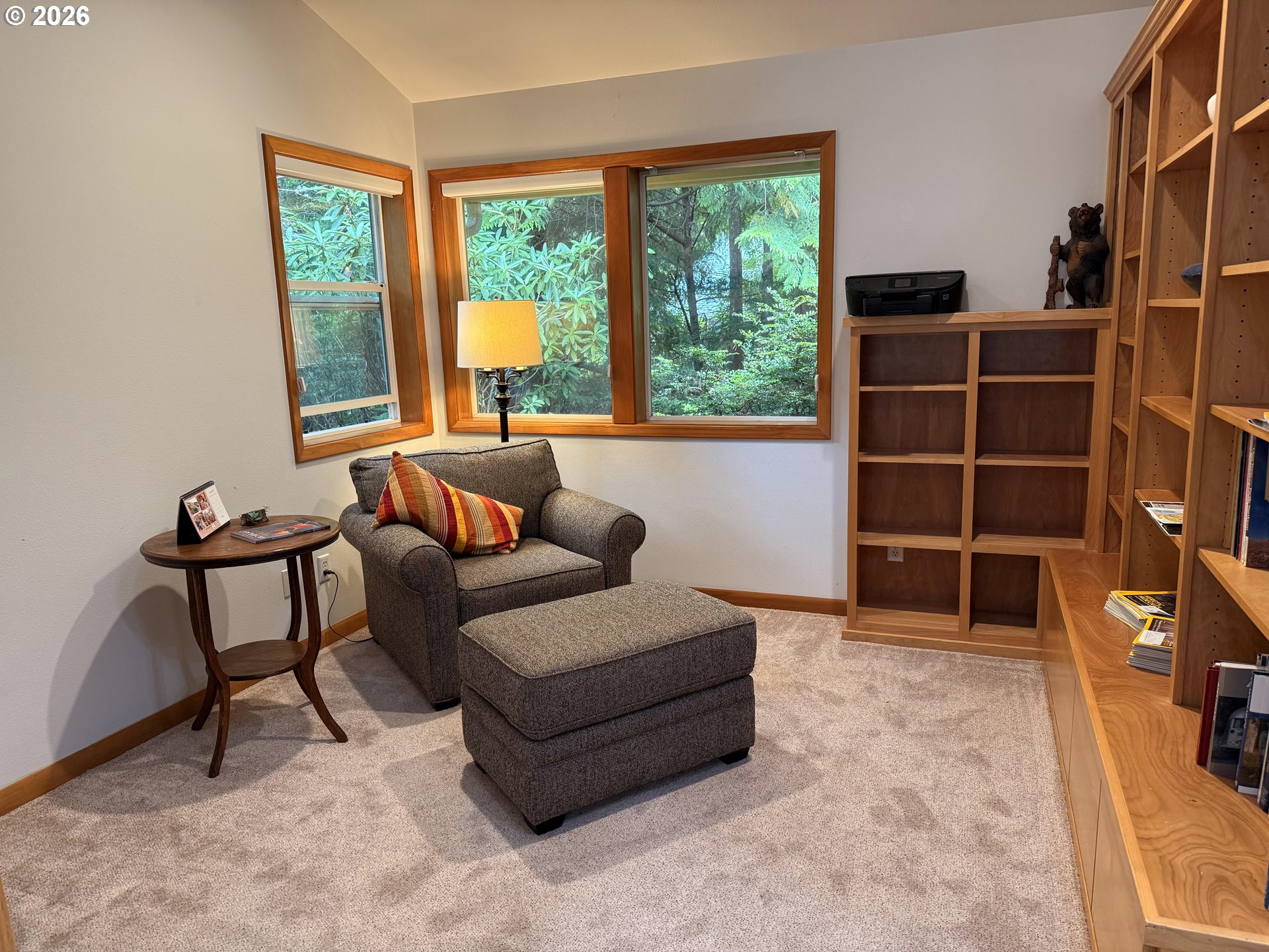 95 Cormorant Depoe Bay, OR 97341 - Photo 12 of 48 a living room with furniture and a flat screen tv