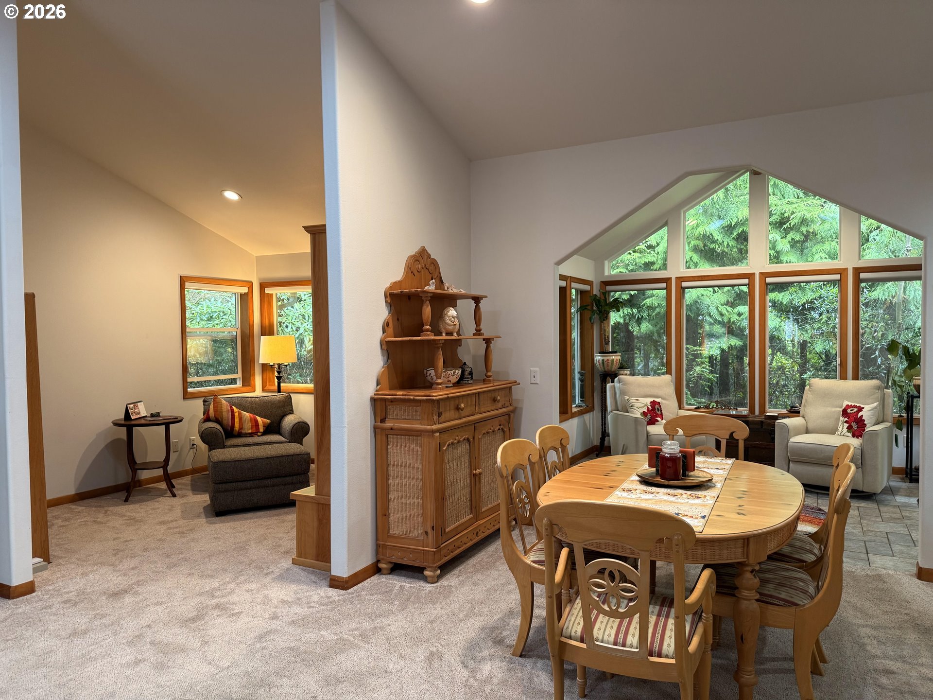 95 Cormorant Depoe Bay, OR 97341 - Photo 14 of 48 a dining room with furniture and a floor to ceiling window