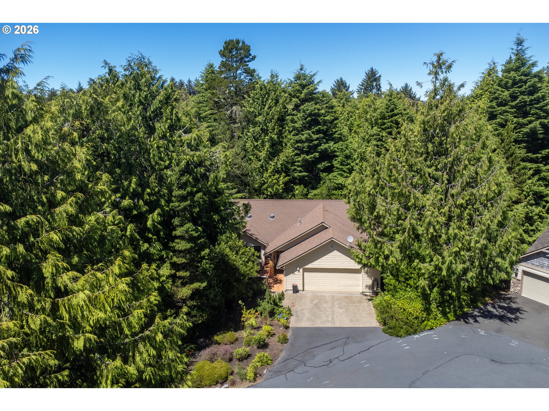 95 Cormorant Depoe Bay, OR 97341 - Photo 2 of 48 a view of a house with a yard