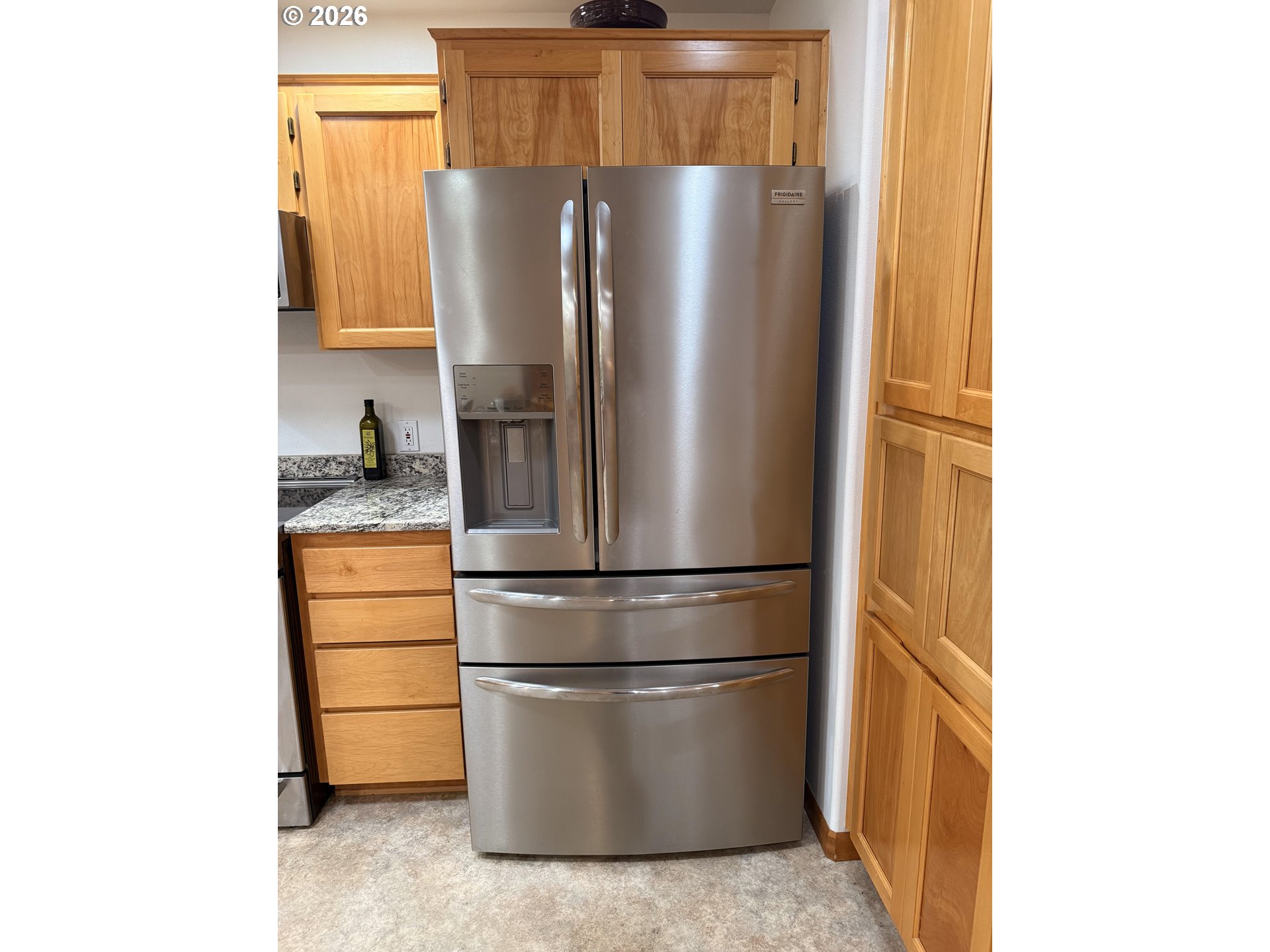 95 Cormorant Depoe Bay, OR 97341 - Photo 23 of 48 a refrigerator freezer sitting inside of a kitchen