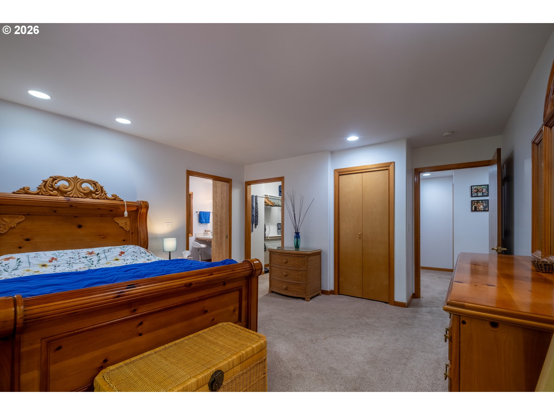 95 Cormorant Depoe Bay, OR 97341 - Photo 25 of 48 a room that has a bed and a dresser in it