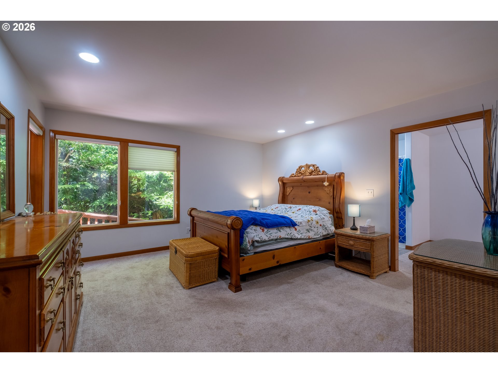 95 Cormorant Depoe Bay, OR 97341 - Photo 27 of 48 a bedroom with a bed and window
