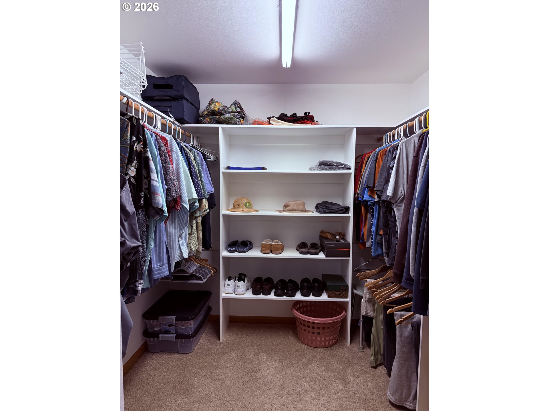 95 Cormorant Depoe Bay, OR 97341 - Photo 28 of 48 a view of walk in closet with clothes and shoes