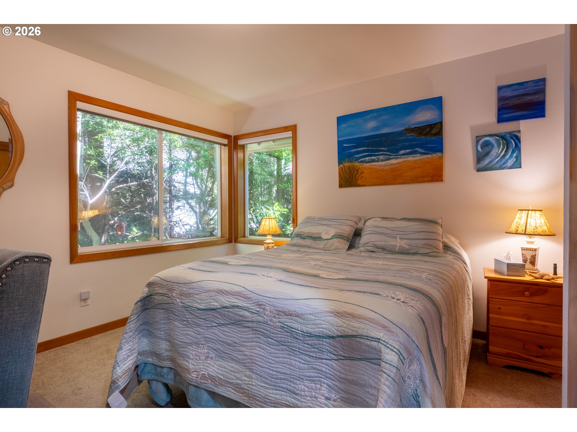 95 Cormorant Depoe Bay, OR 97341 - Photo 30 of 48 a bedroom with a bed and a large window