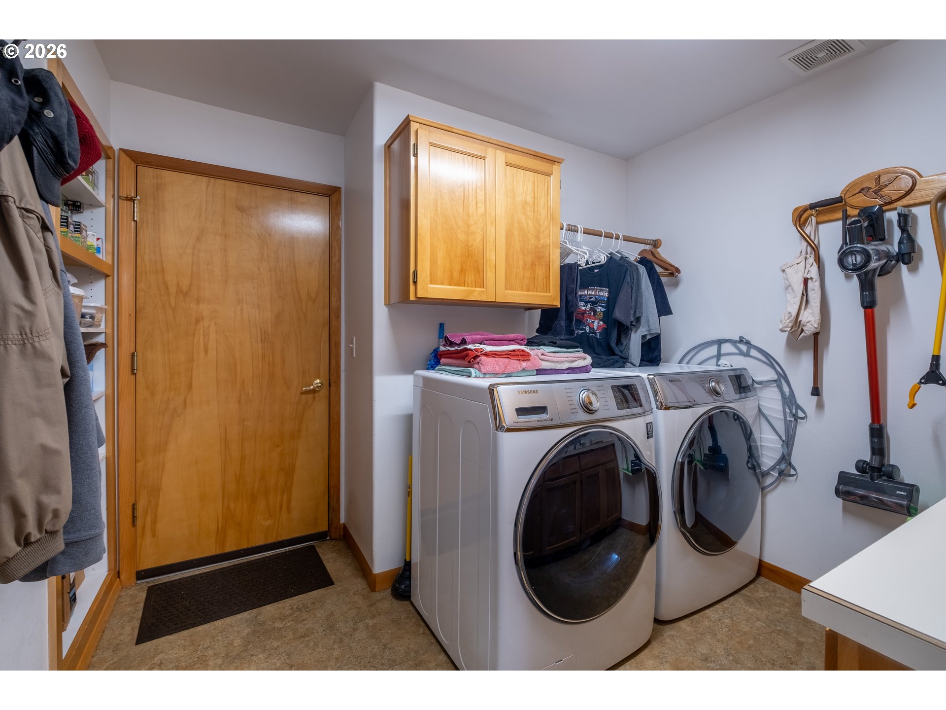 95 Cormorant Depoe Bay, OR 97341 - Photo 33 of 48 a utility room with dryer and washer