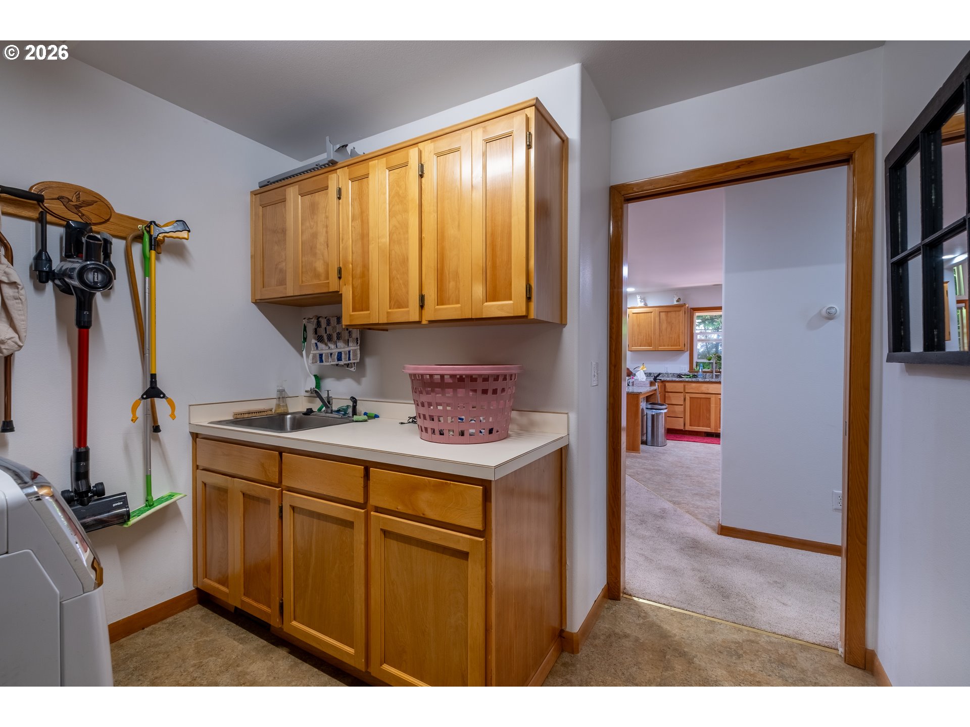 95 Cormorant Depoe Bay, OR 97341 - Photo 34 of 48 a kitchen with a stove a refrigerator and a sink