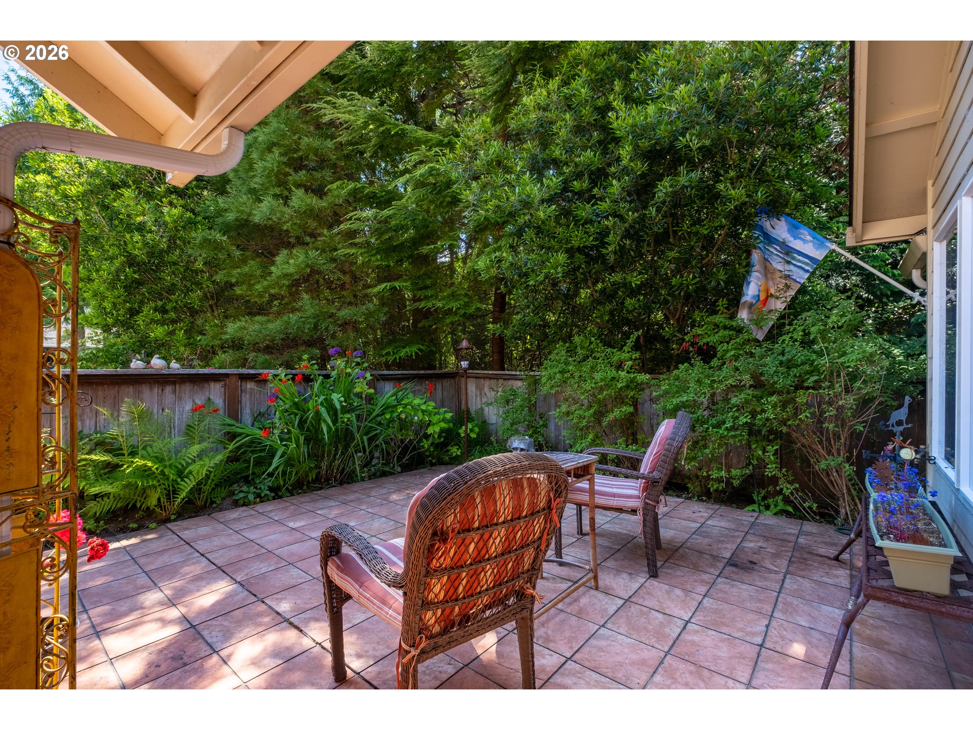 95 Cormorant Depoe Bay, OR 97341 - Photo 5 of 48 a backyard view with a seating space