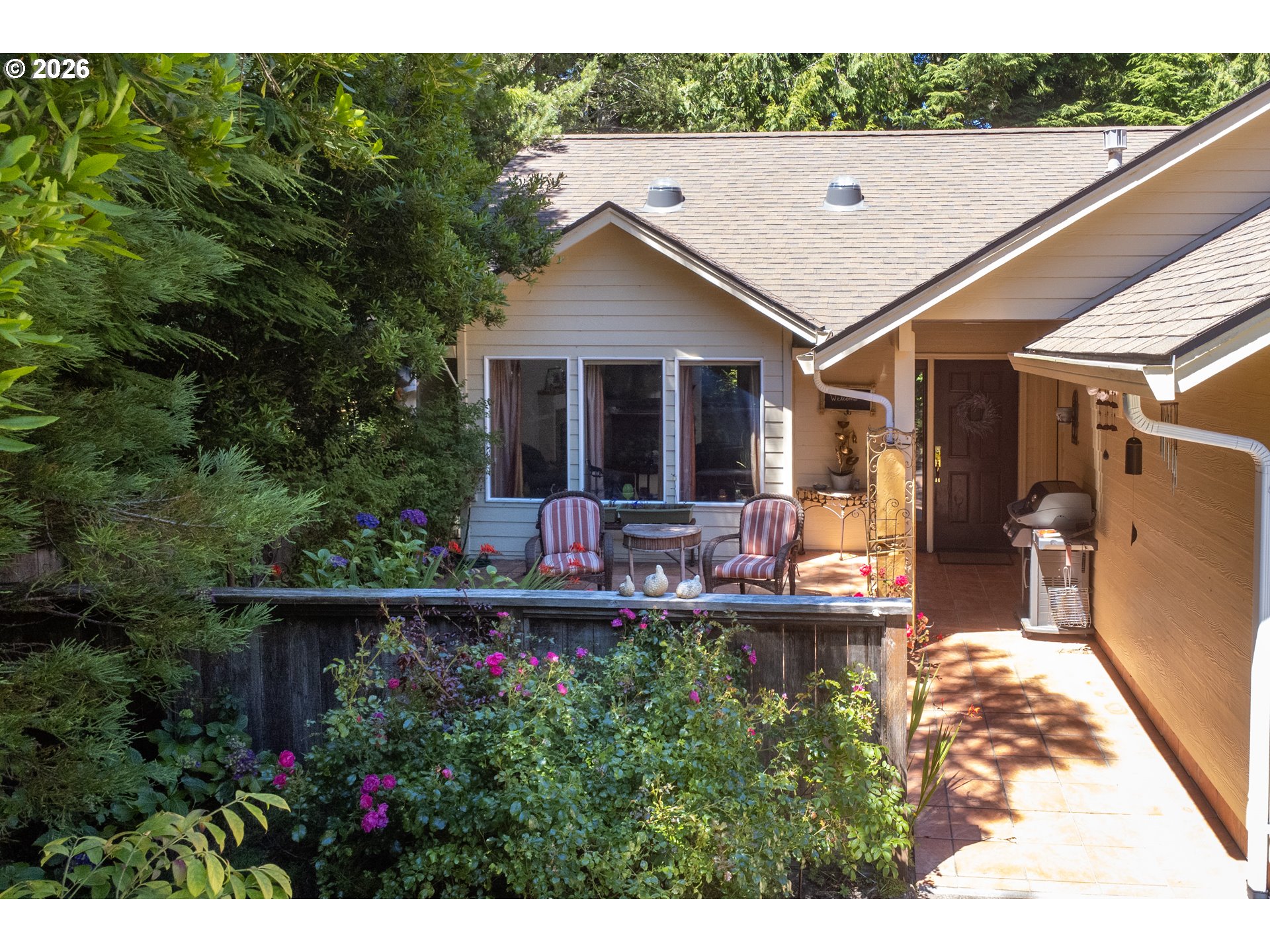 95 Cormorant Depoe Bay, OR 97341 - Photo 6 of 48 a view of house with backyard outdoor seating and hardwood