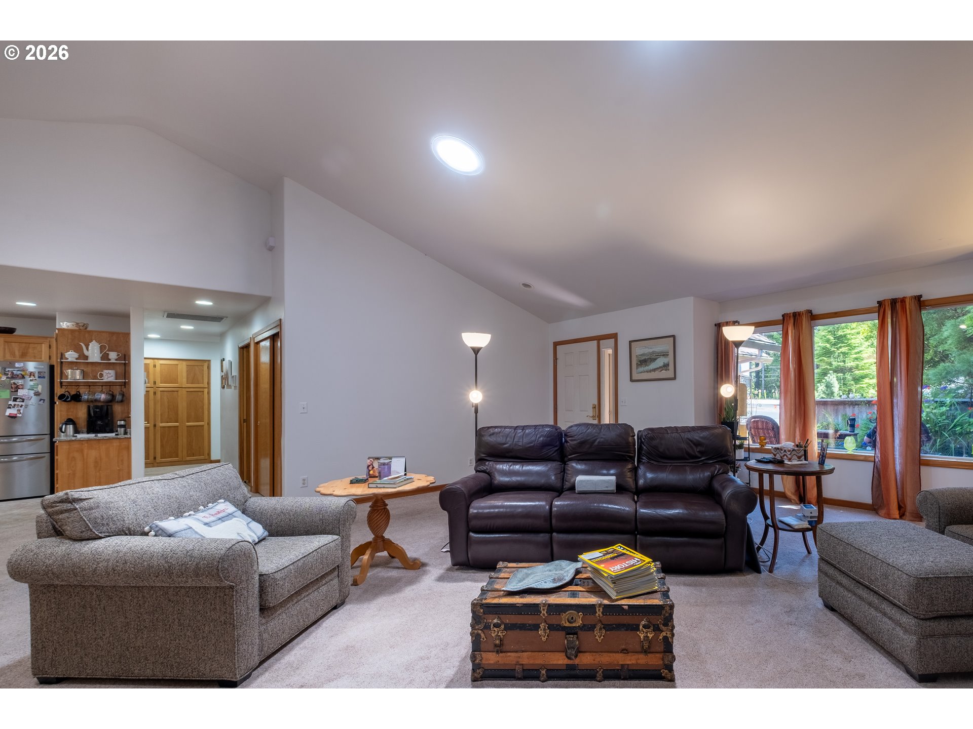 95 Cormorant Depoe Bay, OR 97341 - Photo 8 of 48 a living room with furniture a large window and kitchen view